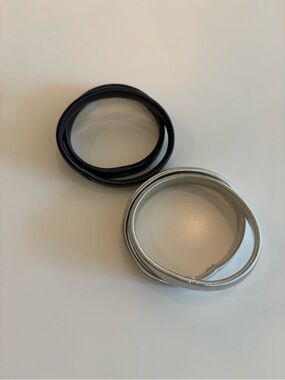 Set of Two Coil Wrap Sleeve Holders in Black and Silver